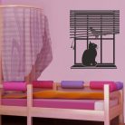 Macska ül az ablakban falmatrica